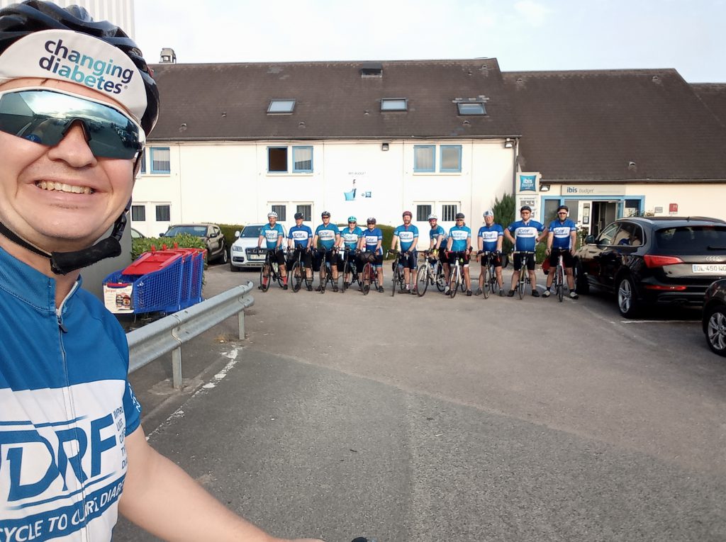 Team in front of the hotel, 2019